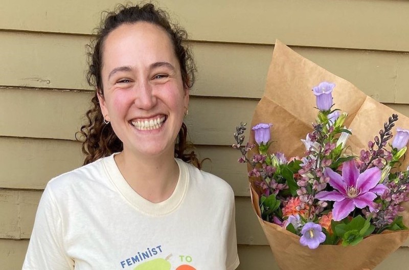 Business owner with flowers.